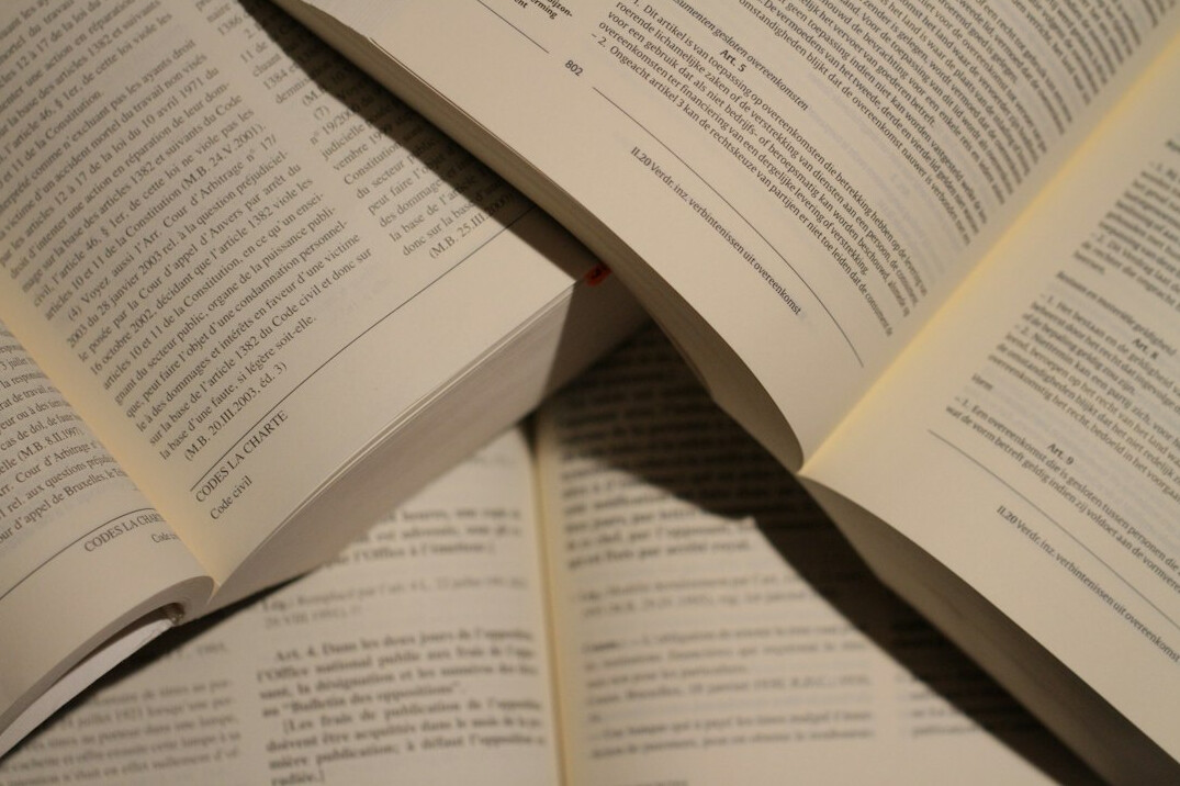 Open books with pages visible on a table