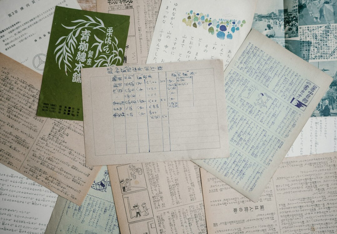 Documents and papers spread on a table